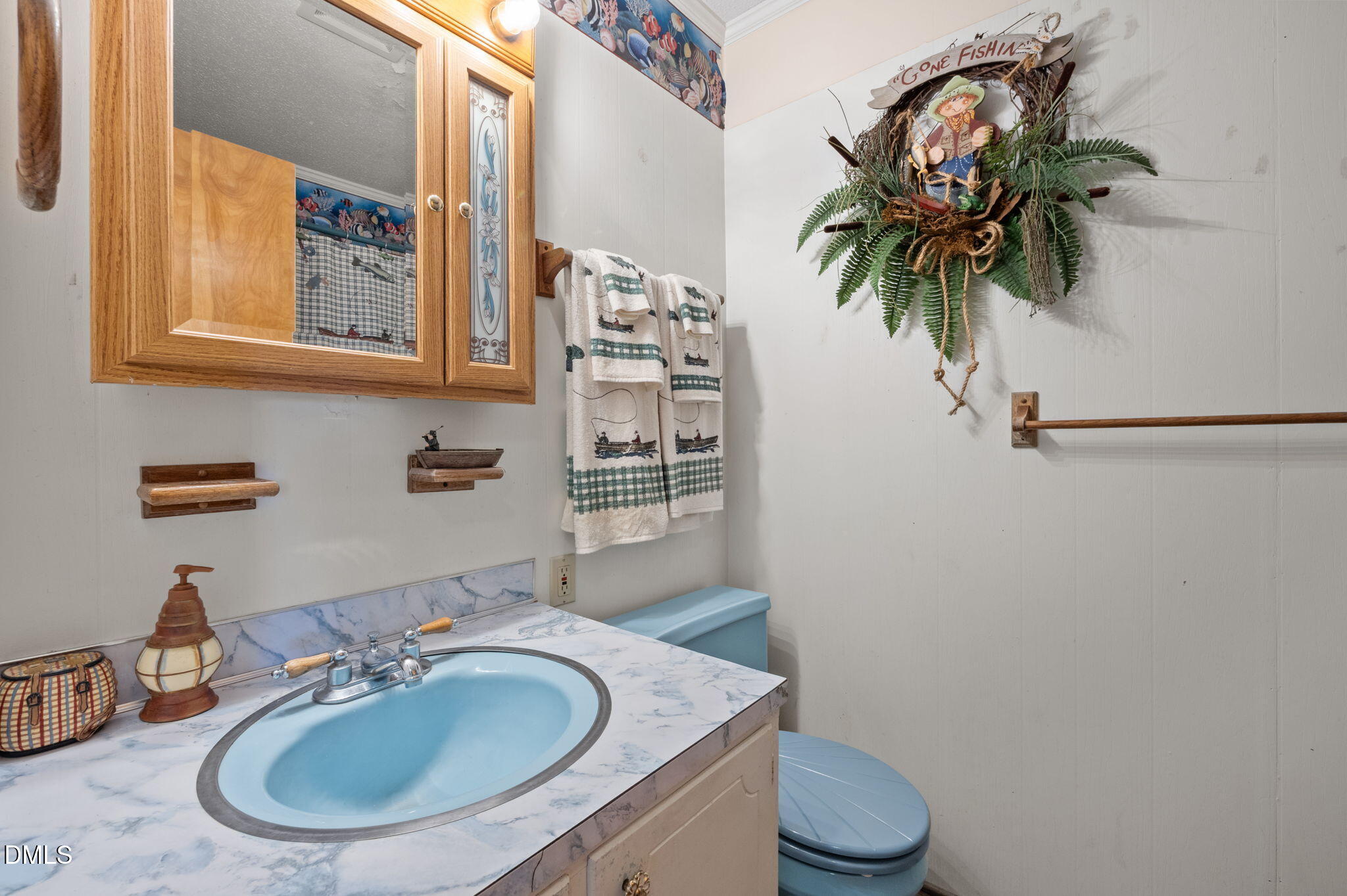 154 Spinnaker Lane Semora, NC 27343 - Photo 30 of 61 a bathroom with a granite countertop sink and a mirror