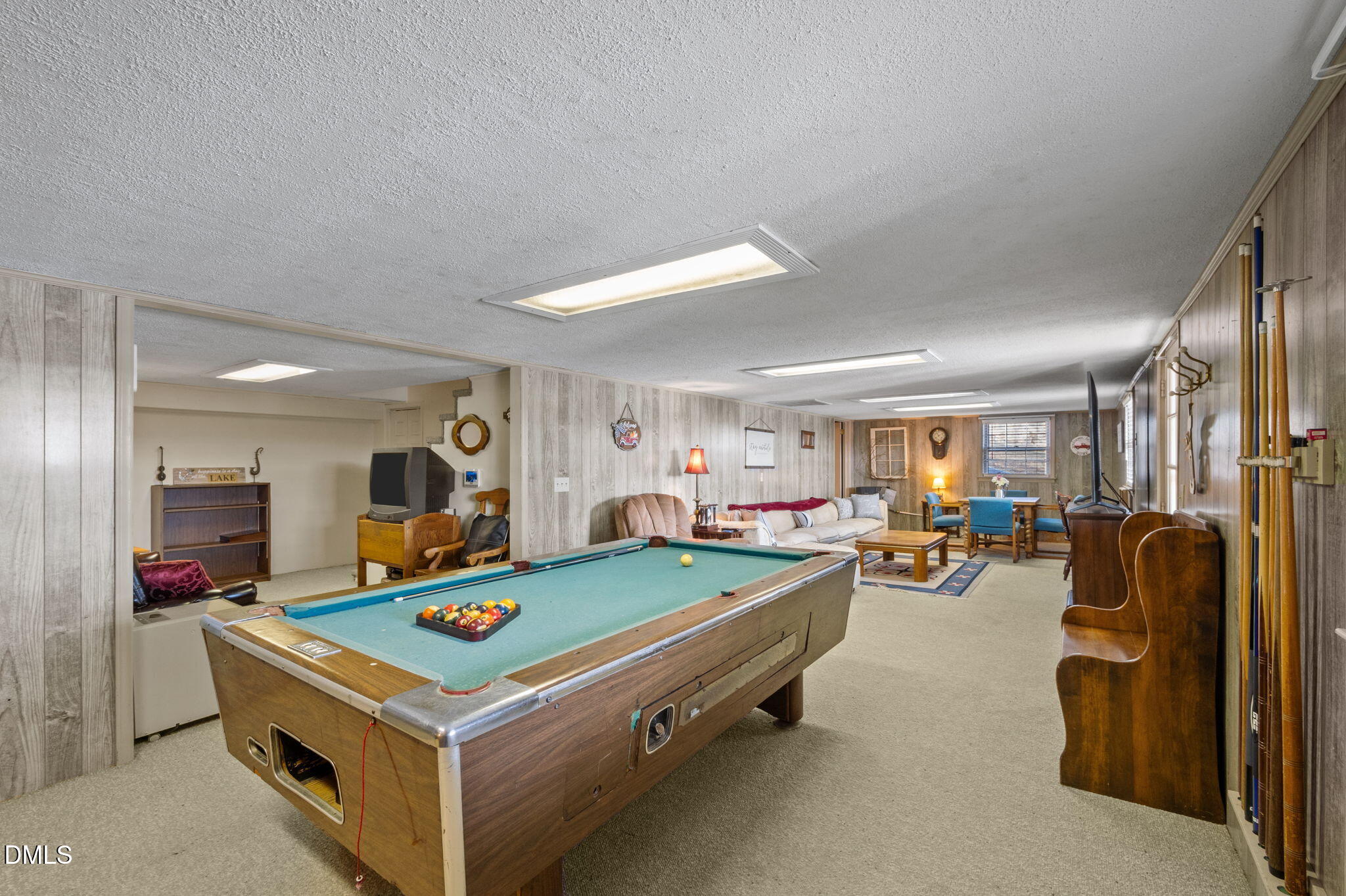 154 Spinnaker Lane Semora, NC 27343 - Photo 36 of 61 a living room with pool table and a flat screen tv