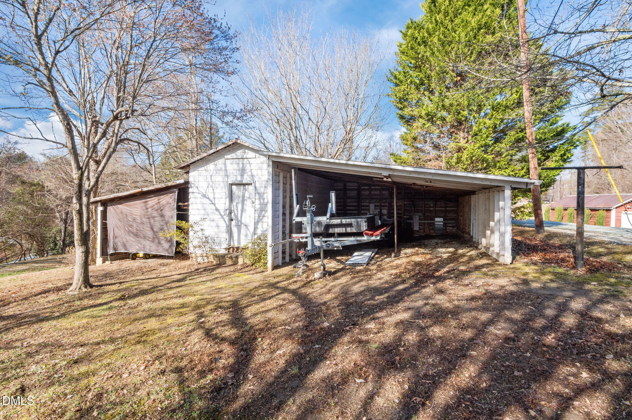 154 Spinnaker Lane Semora, NC 27343 - Photo 47 of 61 a view of a house with a patio and a yard