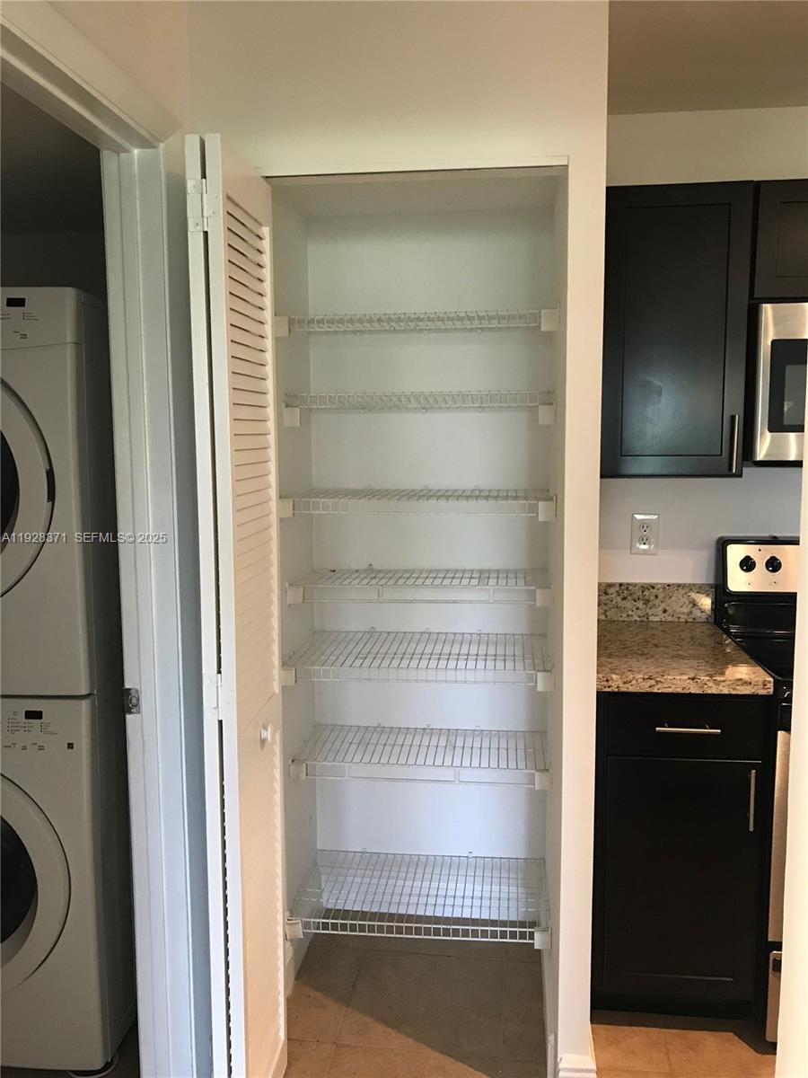 1250 Southwest 113th Terrace, Unit 101 Pembroke Pines, FL 33025 - Photo 8 of 17 a view of a kitchen from the kitchen
