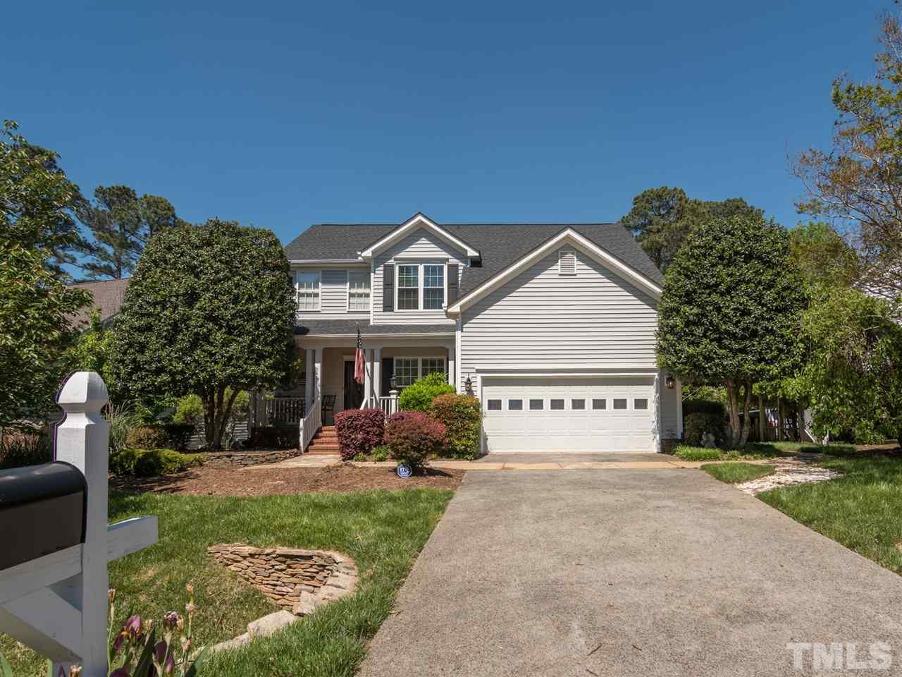 5604 Southern Cross Avenue Raleigh, NC 27606 - Photo 2 of 29 a front view of a house with garden