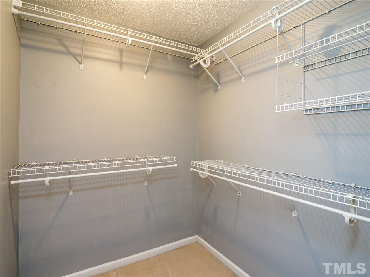 5604 Southern Cross Avenue Raleigh, NC 27606 - Photo 25 of 29 a view of a room with racks on the wall