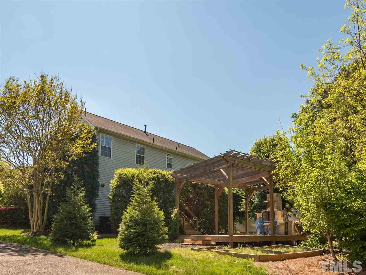 5604 Southern Cross Avenue Raleigh, NC 27606 - Photo 5 of 29 a view of house with yard