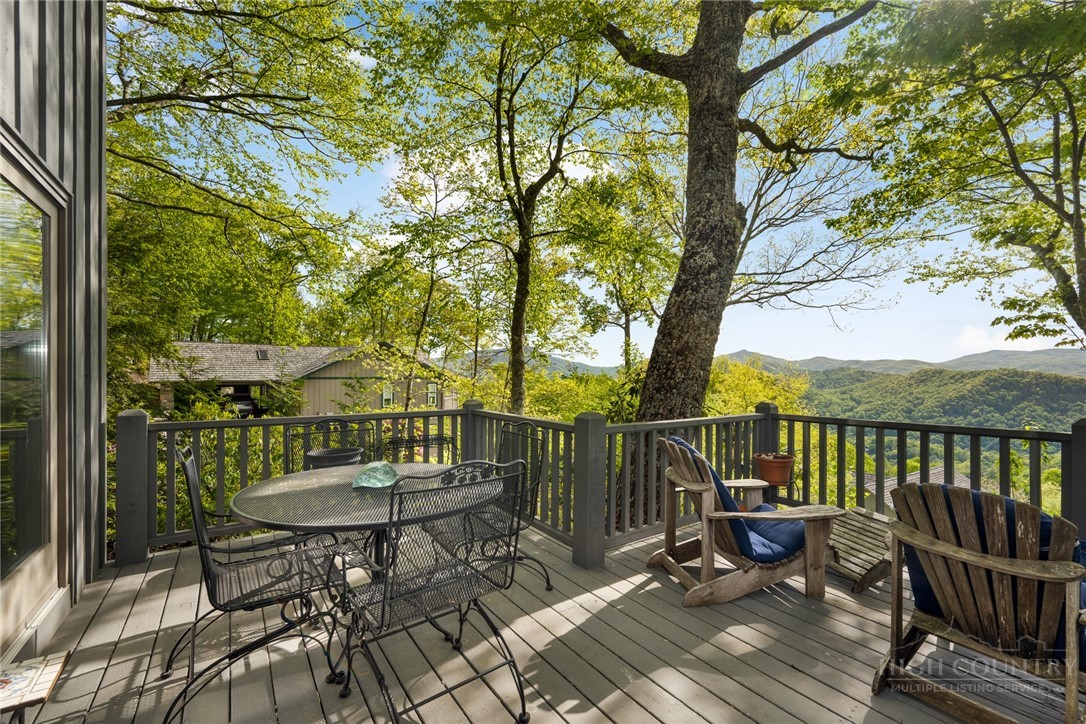 246 Mulberry Lane Boone, NC 28607 - Photo 14 of 49 a view of a chairs in a deck