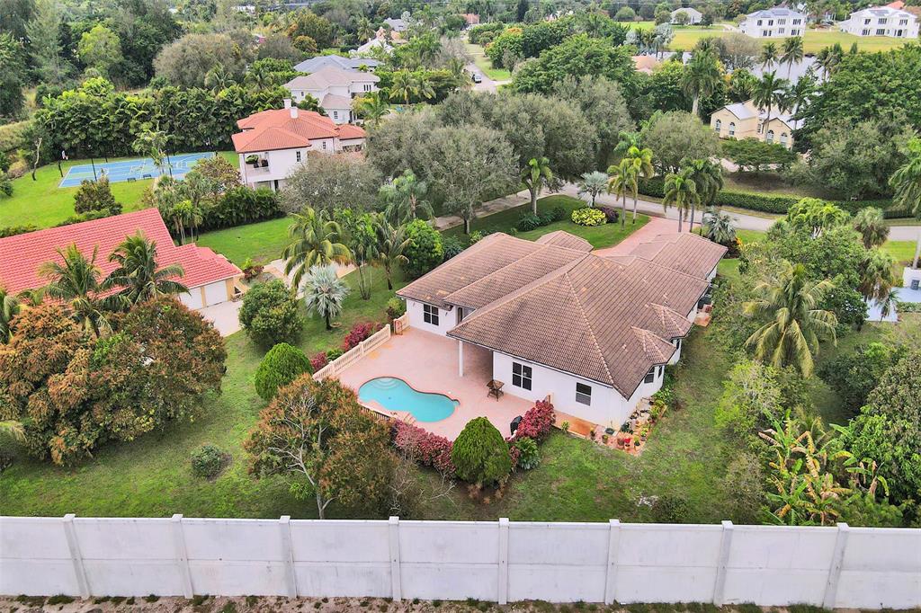 8426 Sawpine Road Delray Beach, FL 33446 - Photo 12 of 91 an aerial view of house with yard