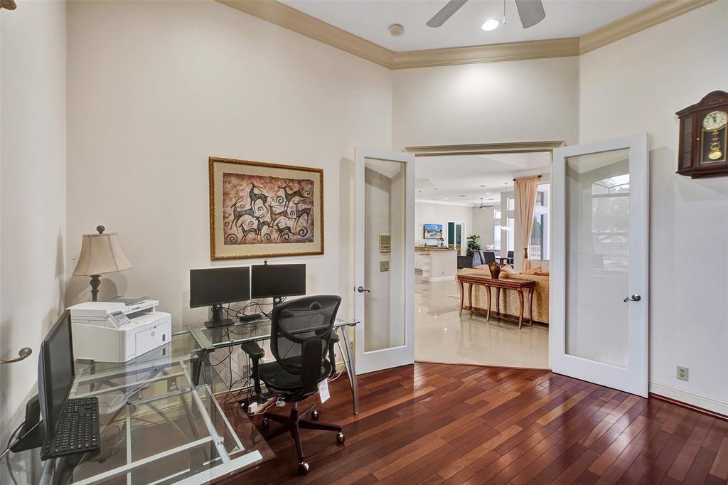 8426 Sawpine Road Delray Beach, FL 33446 - Photo 49 of 91 a view of a workspace with furniture and wooden floor