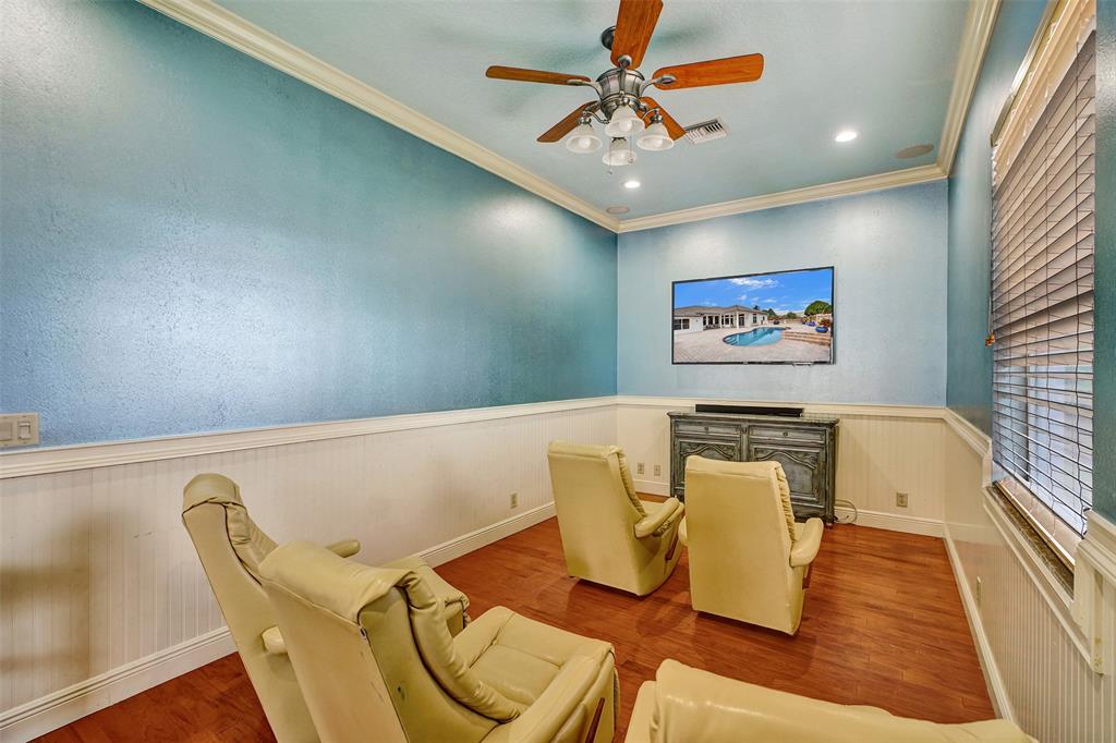8426 Sawpine Road Delray Beach, FL 33446 - Photo 71 of 91 a view of a dining room with furniture a chandelier and wooden floor
