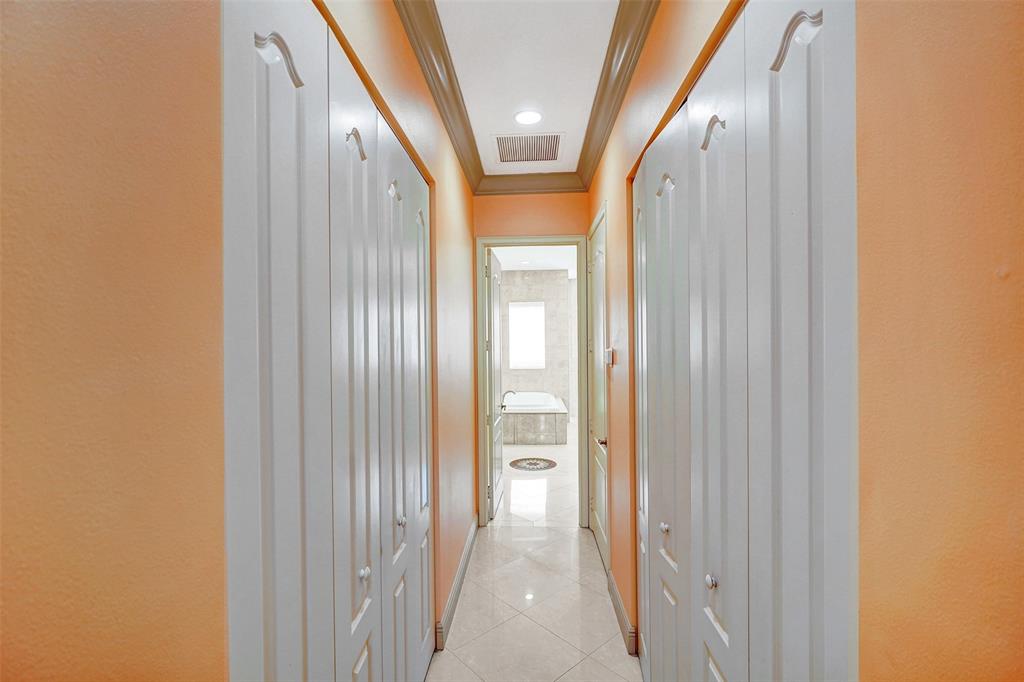 8426 Sawpine Road Delray Beach, FL 33446 - Photo 81 of 91 a view of a hallway with wooden floor and a door