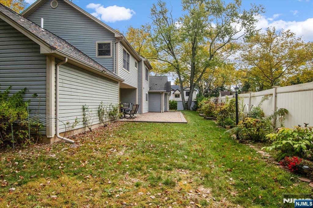 85 Harvey Avenue Paramus, NJ 07652 - Photo 30 of 32 a view of a house with a yard and plants