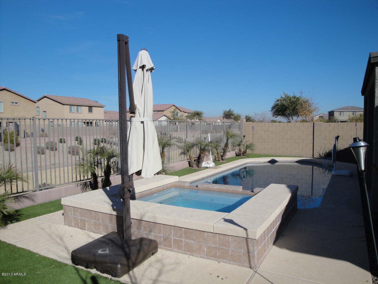 7346 West Carter Road Laveen, AZ 85339 - Photo 26 of 42 a front view of a house with a yard