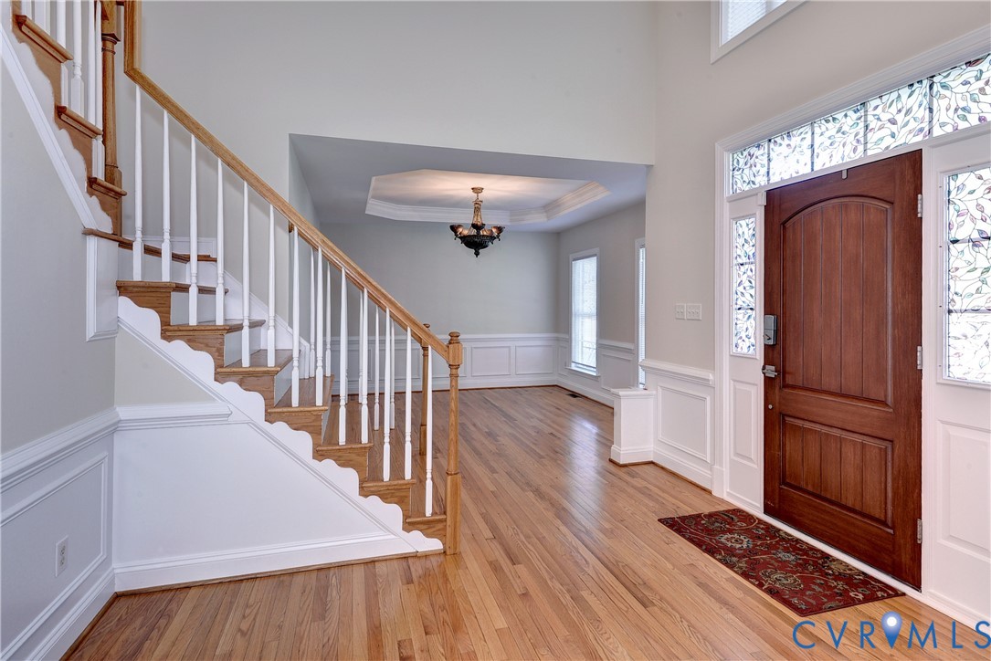 11385 Winding River Road Providence Forge, VA 23140 - Photo 12 of 43 a view of entryway and hall with wooden floor