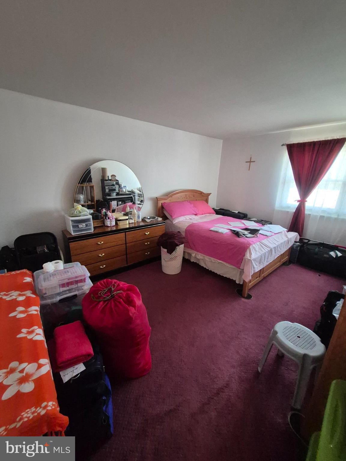 3850 Woodhaven Road, Unit 302 Philadelphia, PA 19154 - Photo 9 of 12 Cozy bedroom with vibrant accents.
