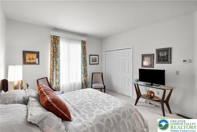 a dinning table and chairs in patio of the house