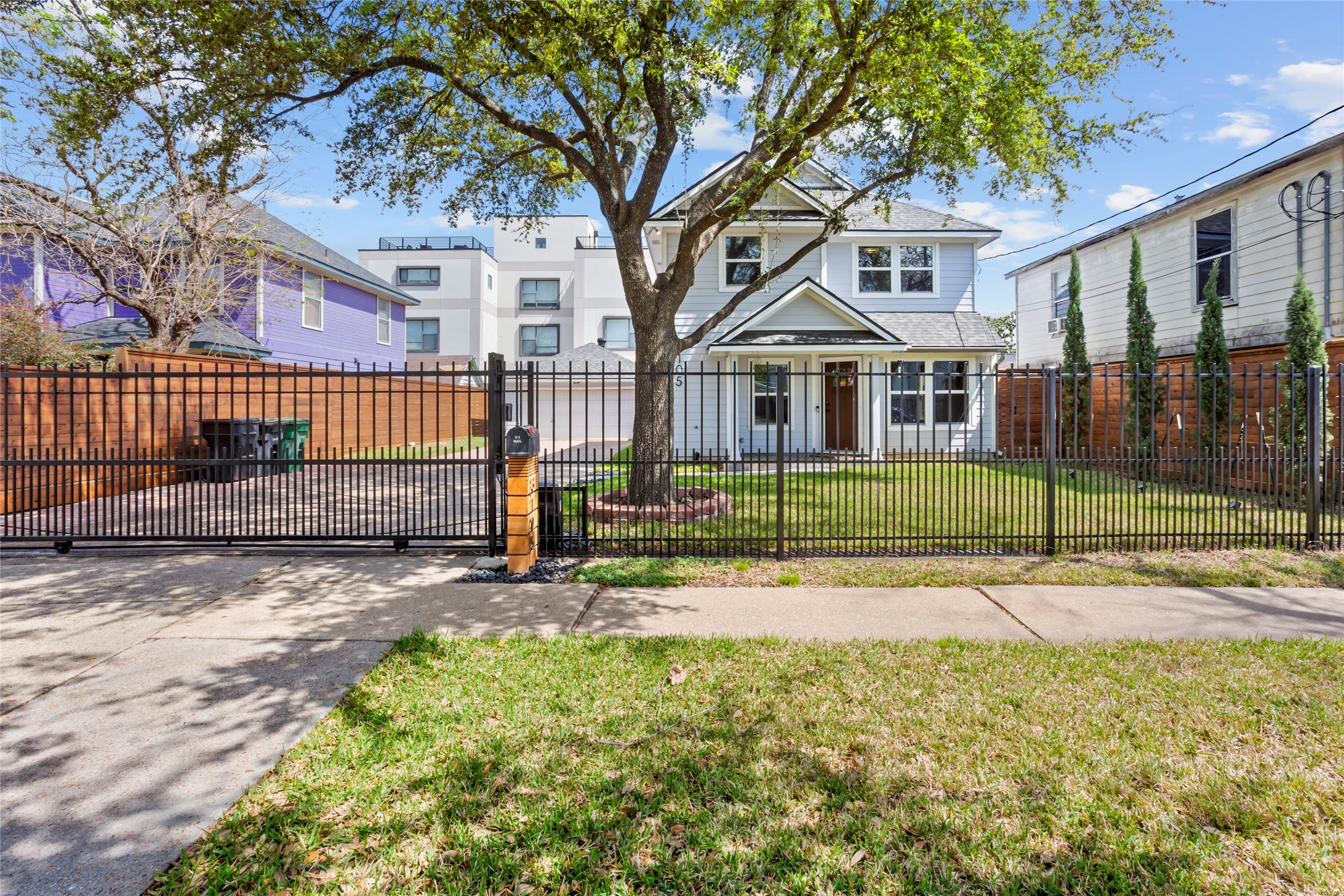 3105 Garrow Street Houston, TX 77003 - Photo 2 of 26 Welcome to 3105 Garrow Street! Private gated entry with both walk through and drive through access.