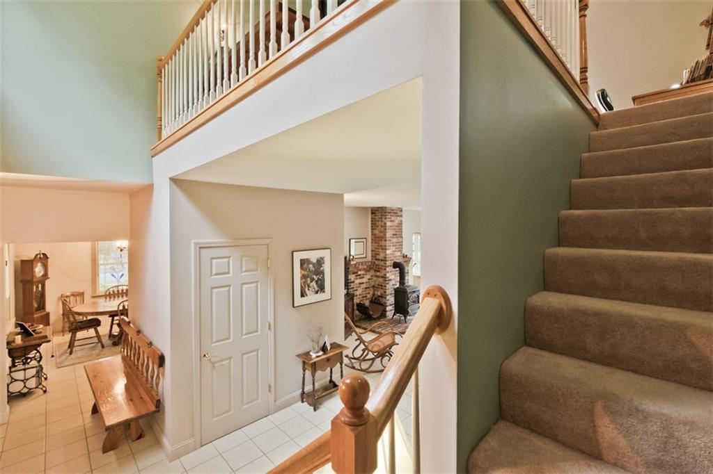 546 Upper Ridge Road Bridgton, ME 04009 - Photo 22 of 35 Stairs heading up to the second...