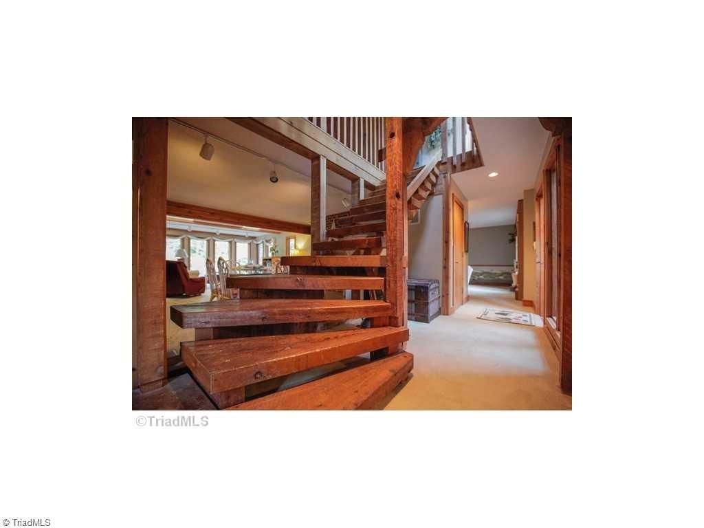 5078 Bunch Road Summerfield, NC 27358 - Photo 12 of 17 Staircase made of solid cedar.