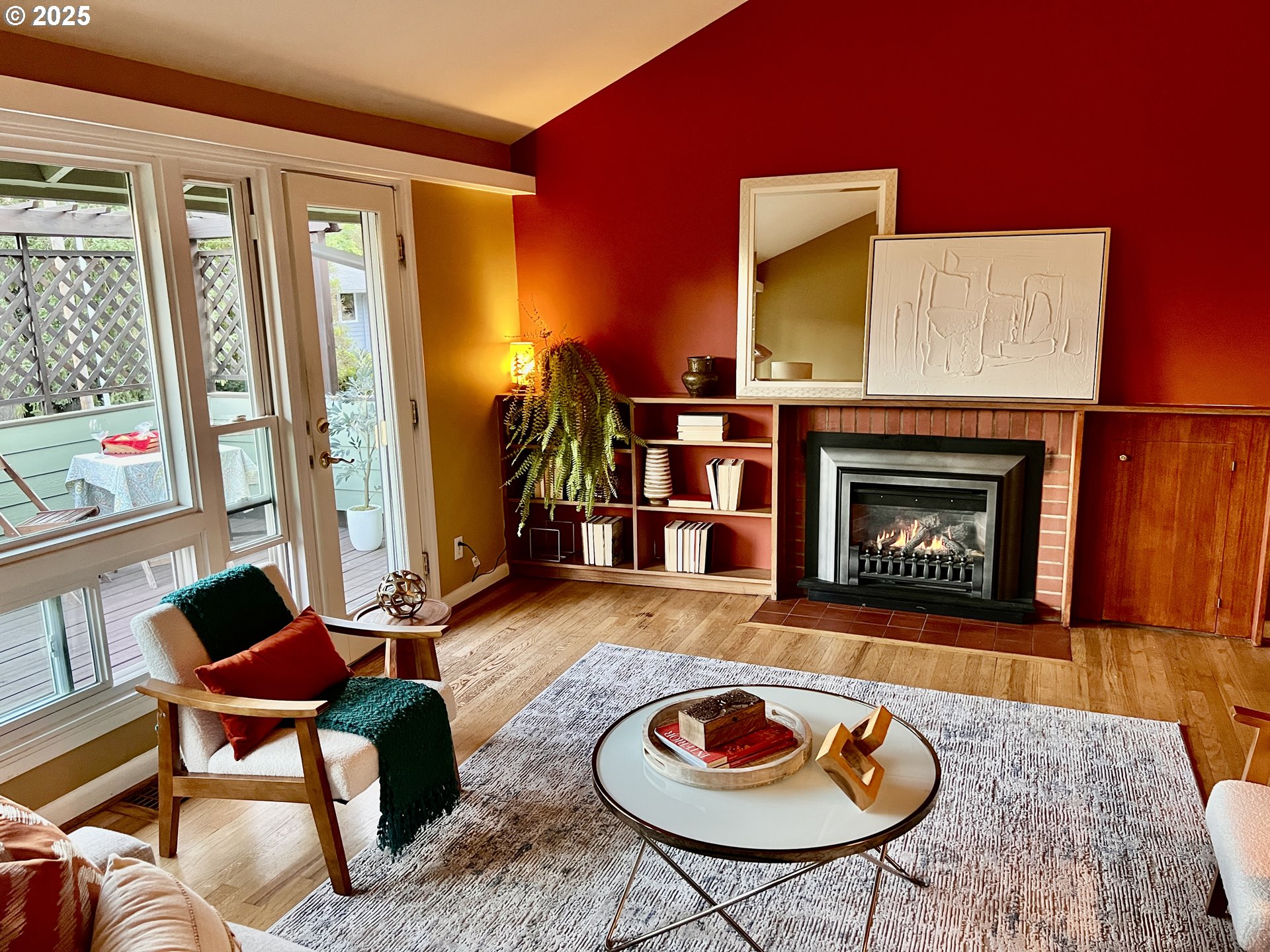 7149 Southwest 3rd Avenue Portland, OR 97219 - Photo 11 of 42 a living room with furniture and a fireplace