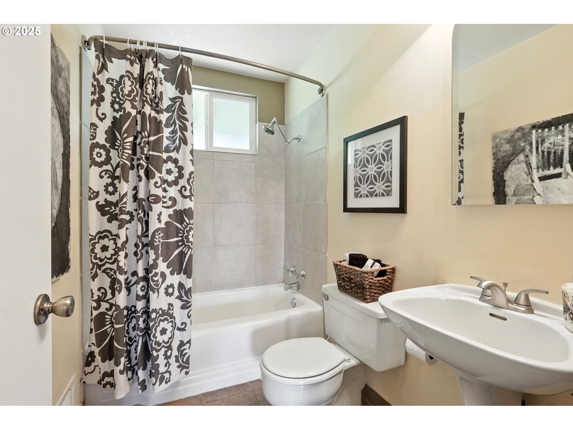 7149 Southwest 3rd Avenue Portland, OR 97219 - Photo 13 of 42 a bathroom with a sink toilet and shower