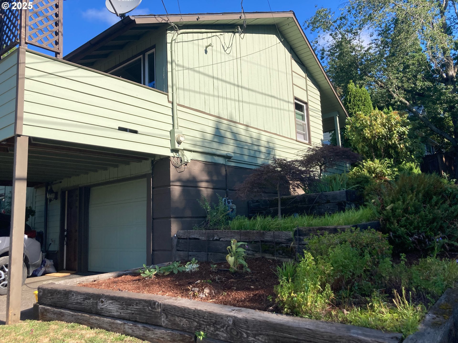 7149 Southwest 3rd Avenue Portland, OR 97219 - Photo 30 of 42 a view of a house with a yard
