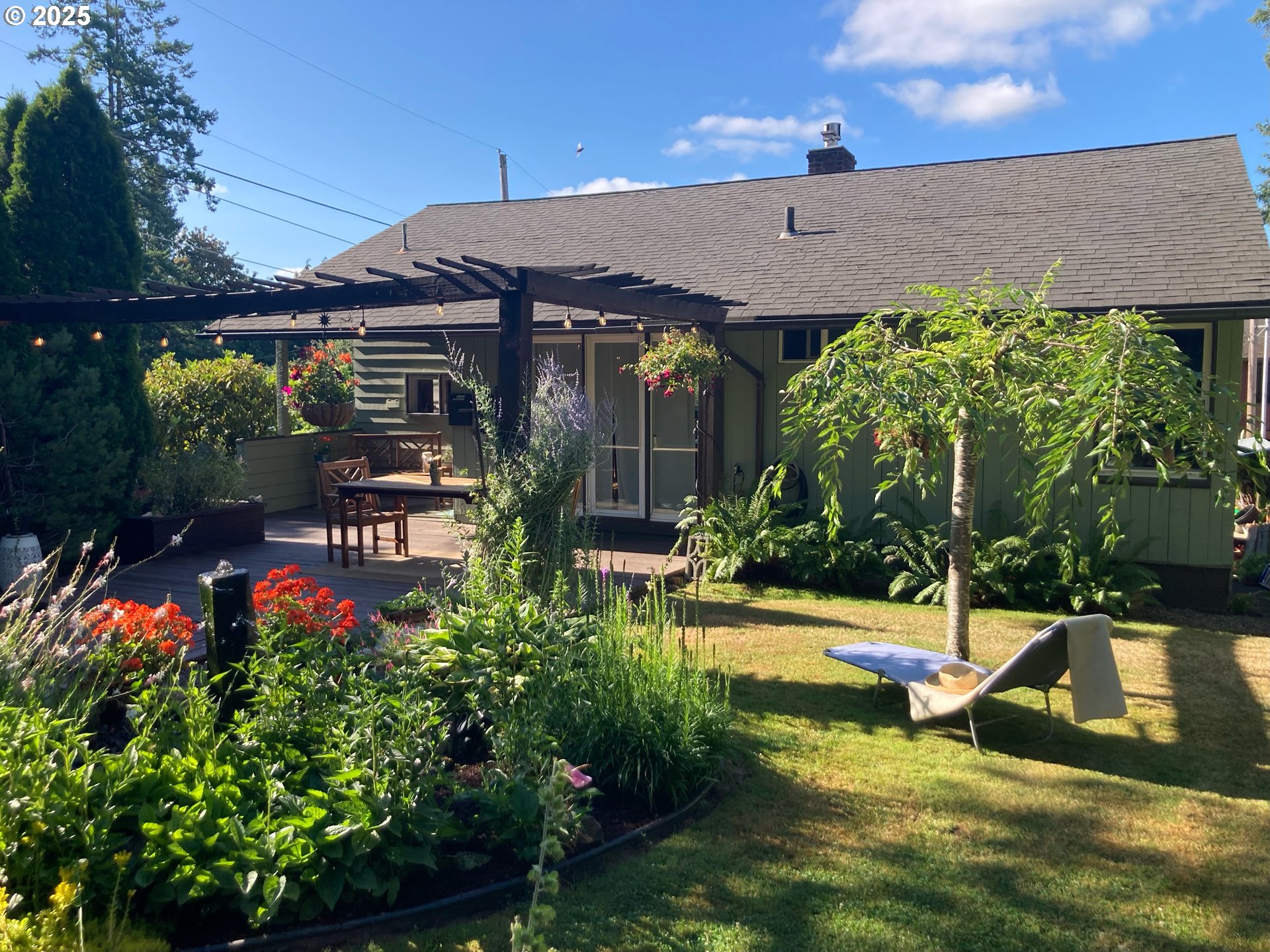 7149 Southwest 3rd Avenue Portland, OR 97219 - Photo 39 of 42 front view of a house with a yard
