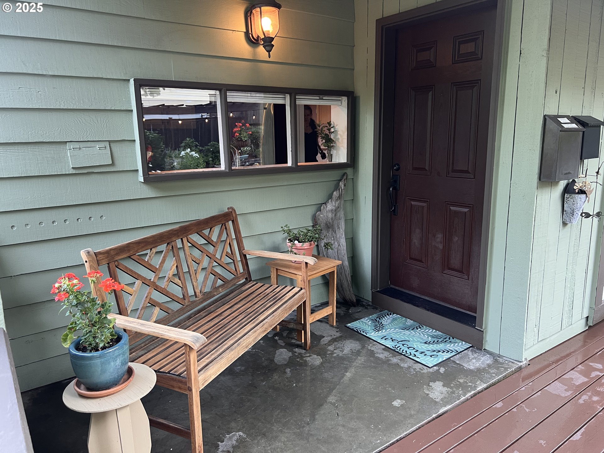 7149 Southwest 3rd Avenue Portland, OR 97219 - Photo 4 of 42 a view of porch with a bench in dining room