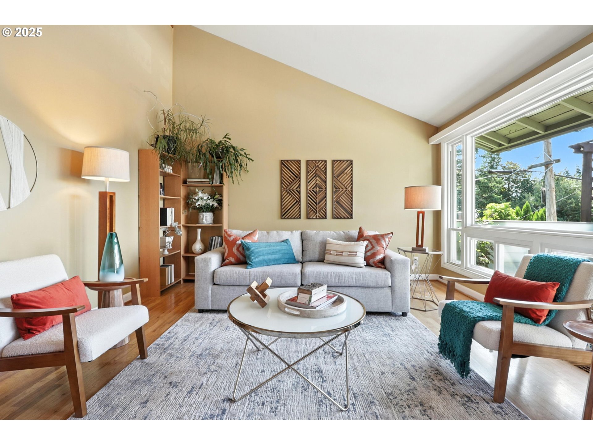 7149 Southwest 3rd Avenue Portland, OR 97219 - Photo 9 of 42 a living room with furniture and a large window