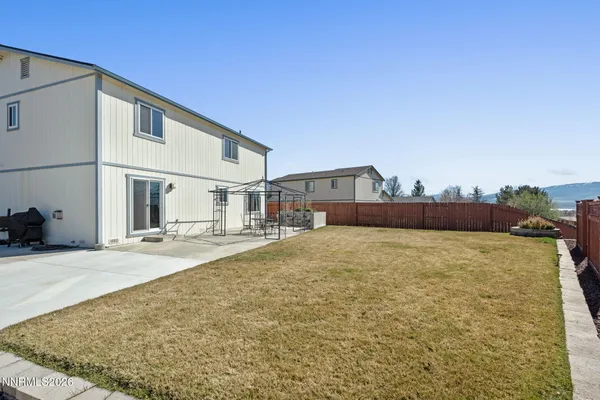a house view with a outdoor space