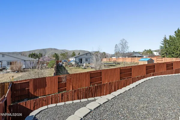 a view of a living room and kitchen