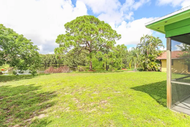 a view of a house with a garden