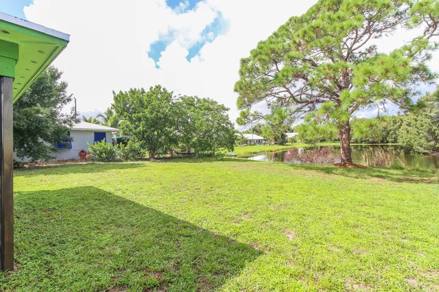 a view of a house with a garden