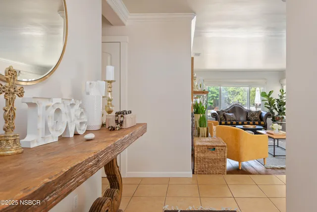 a view of a living room and dining room