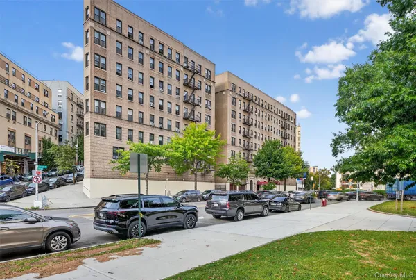 a view of a street with cars