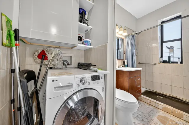 a view of living room washer and dryer