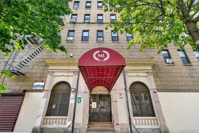 a building with trees in front of it