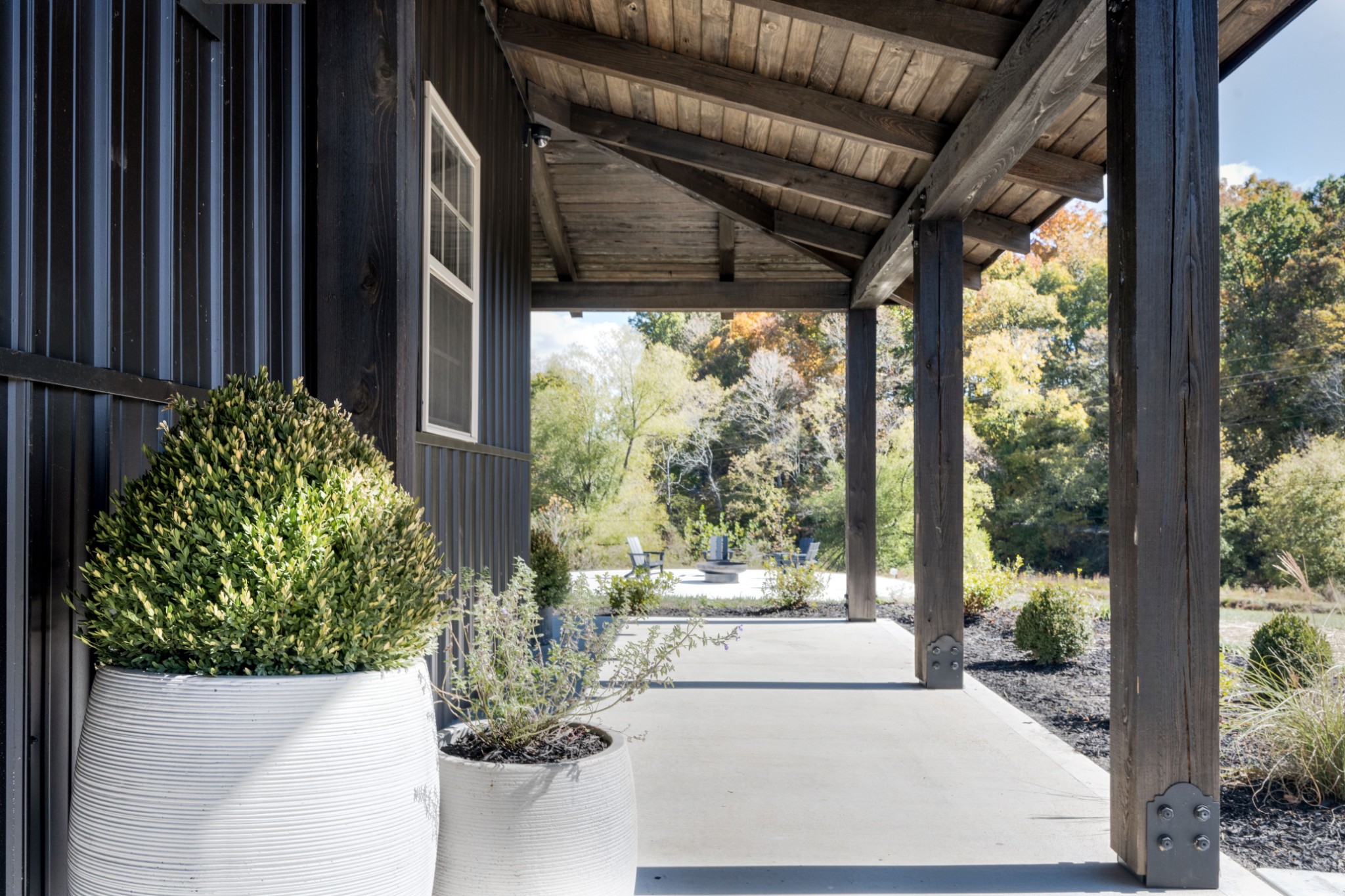 232 Waterloo Road Lawrenceburg, TN 38464 - Photo 8 of 46 a view of a porch with plants and garden