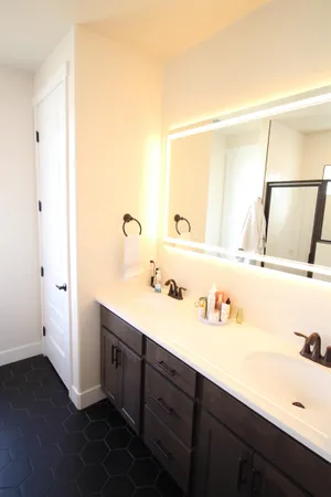 a bathroom with a sink and a mirror