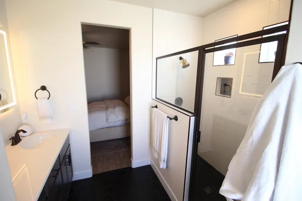 a bathroom with a sink and a mirror