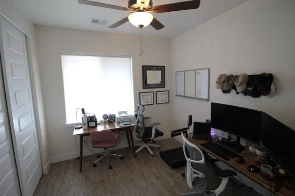 a workspace with wooden floor