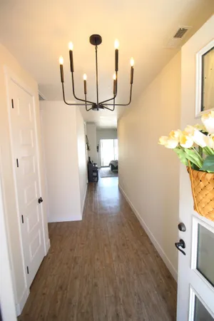 a view of entryway and kitchen