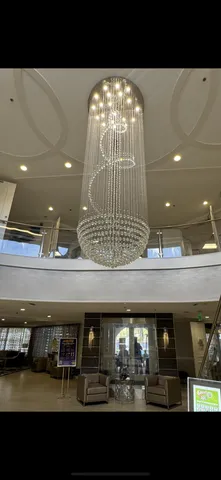 a bathroom with a tub and white sink