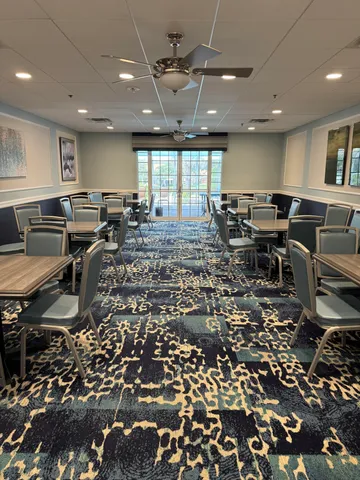 a group of people sitting in a room