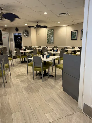 a view of a big room with chairs