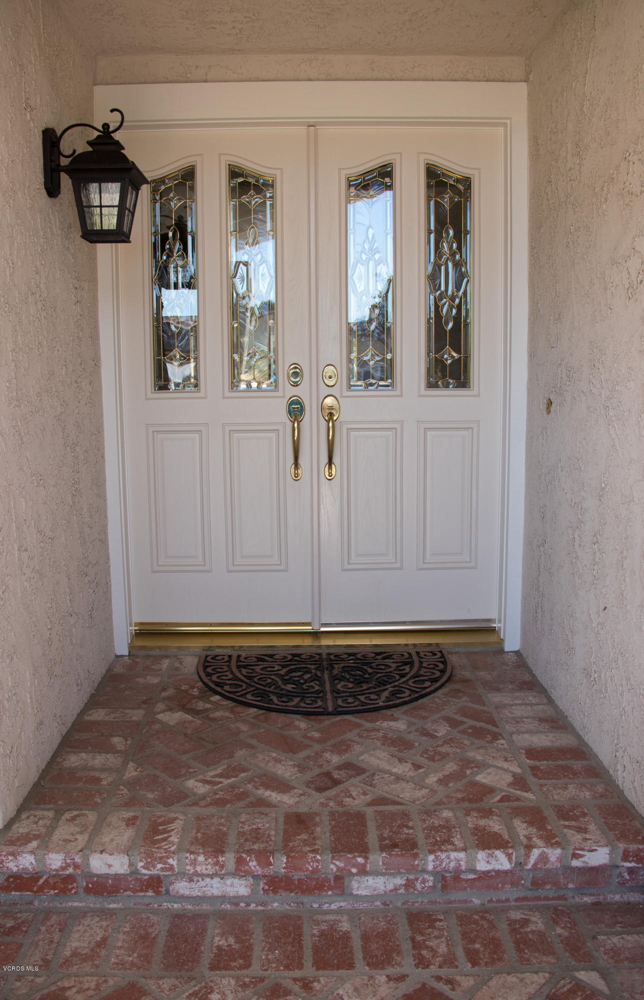 13671 Laurelhurst Road Moorpark, CA 93021 - Photo 4 of 32 a view of a door in front of a house