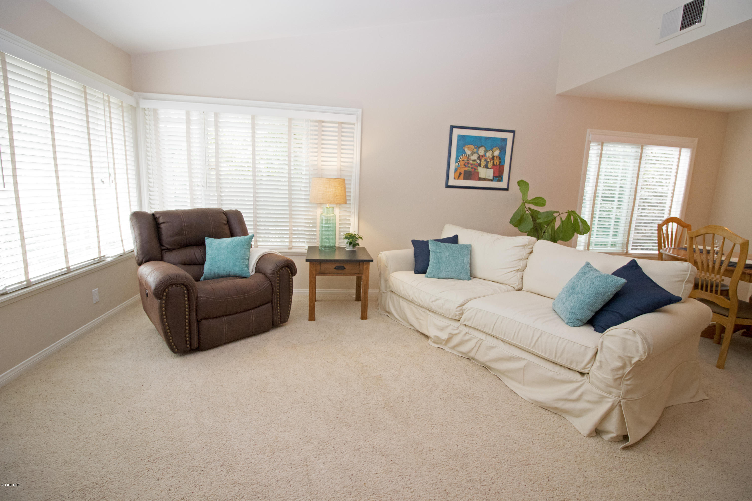 13671 Laurelhurst Road Moorpark, CA 93021 - Photo 6 of 32 a living room with furniture and large windows