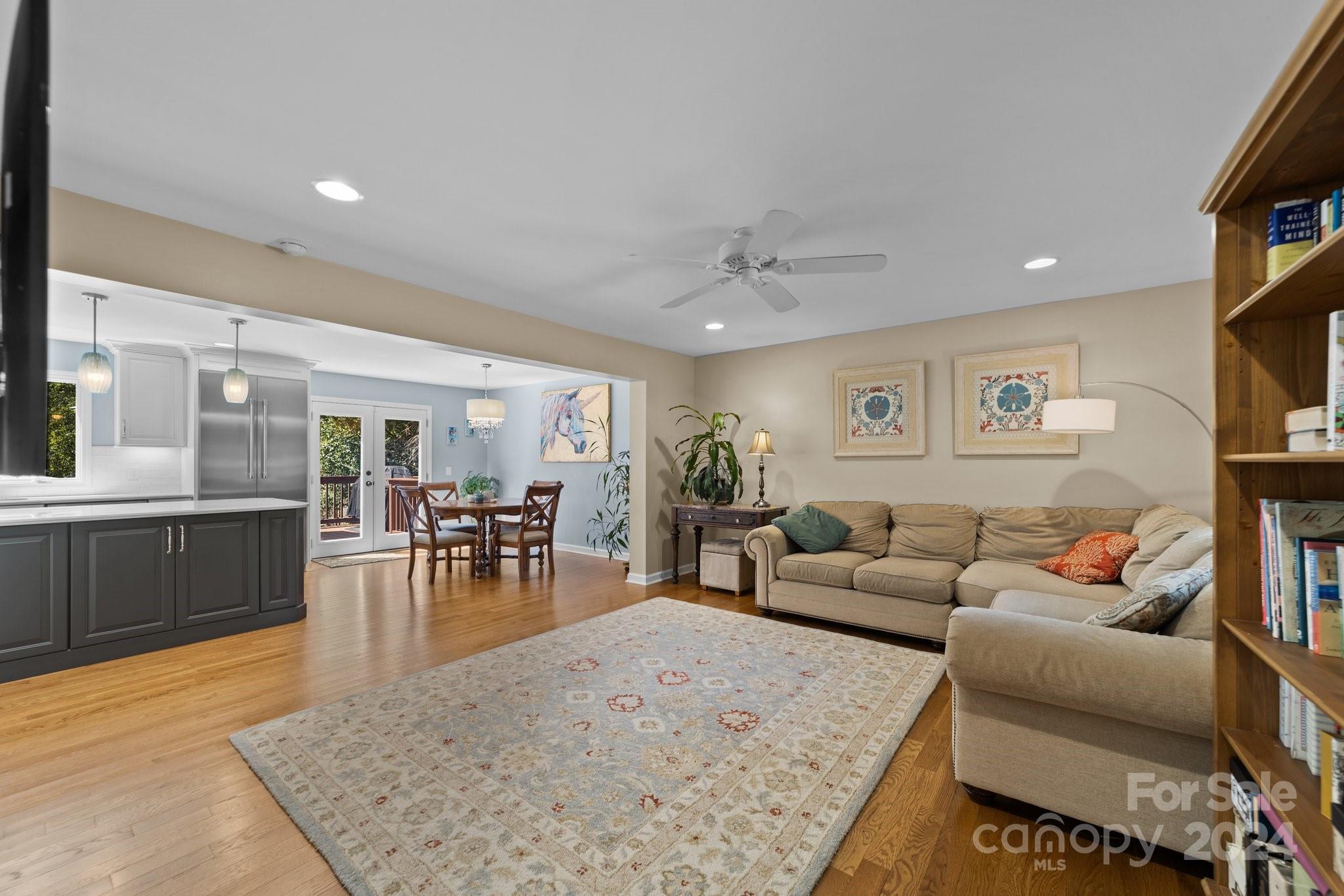 1060 Churchill Road Davidson, NC 28036 - Photo 18 of 41 a living room with furniture and a couch