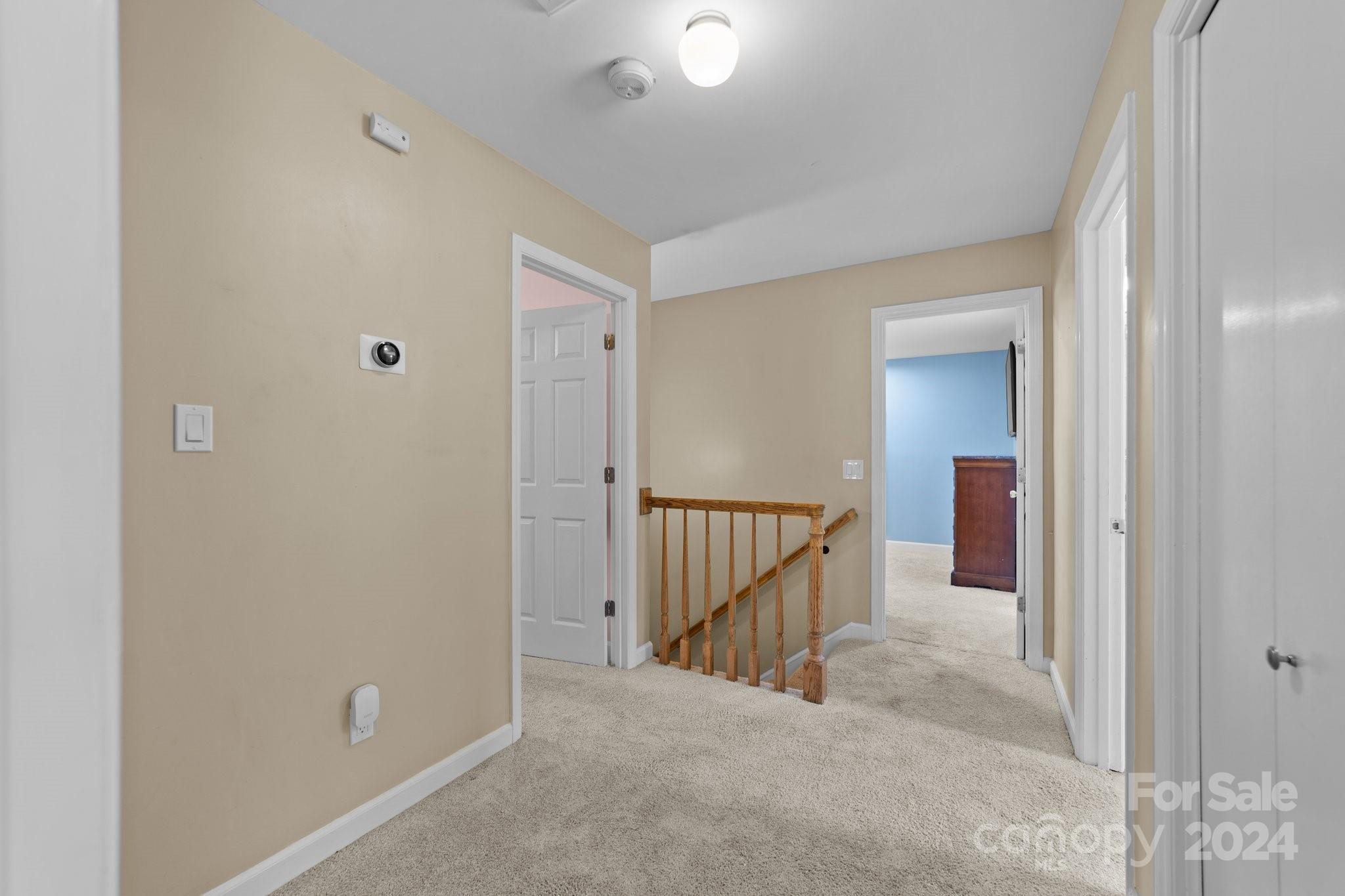 1060 Churchill Road Davidson, NC 28036 - Photo 28 of 41 a view of a hallway with a livingroom and entryway
