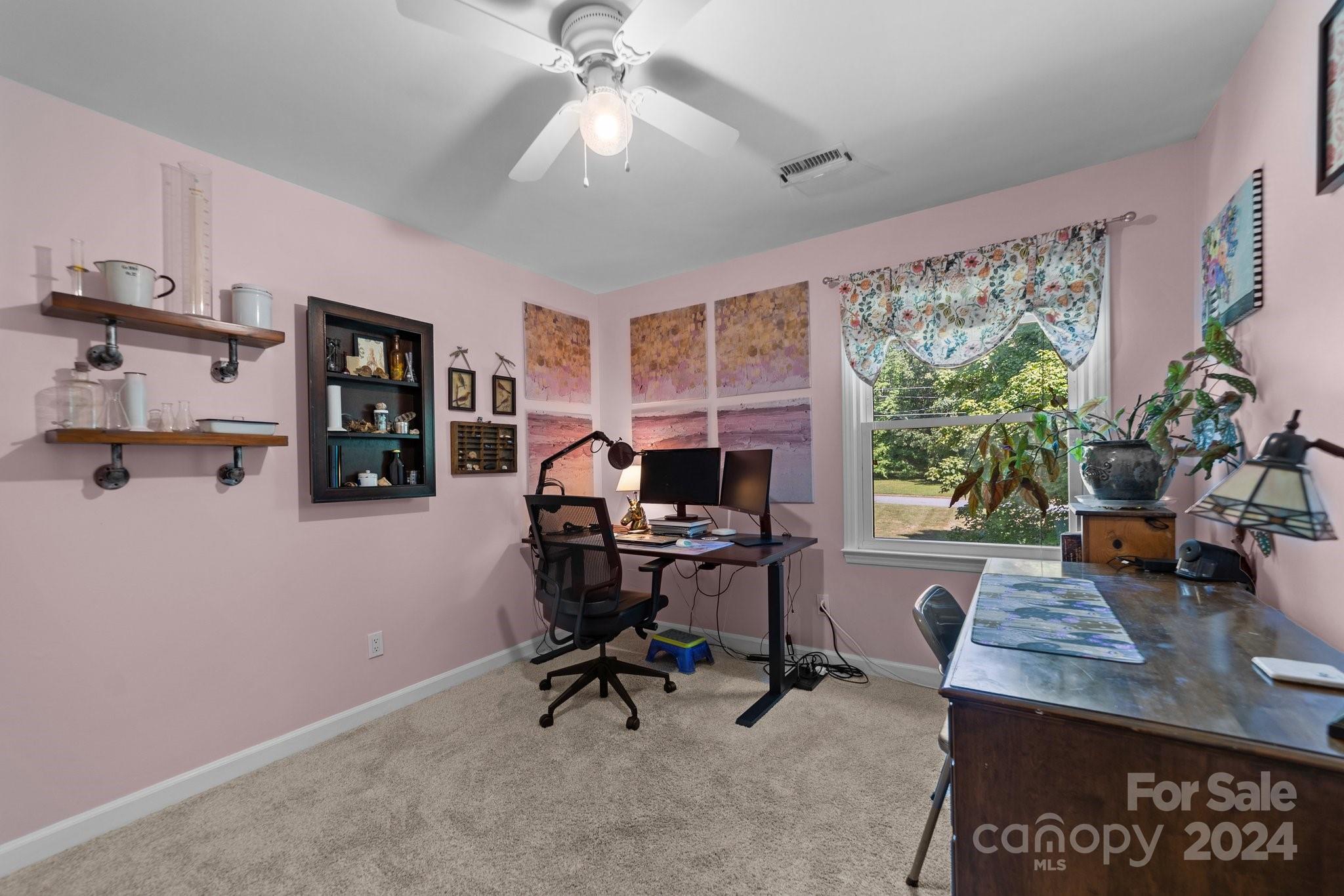 1060 Churchill Road Davidson, NC 28036 - Photo 33 of 41 a view of a workspace with furniture and a window