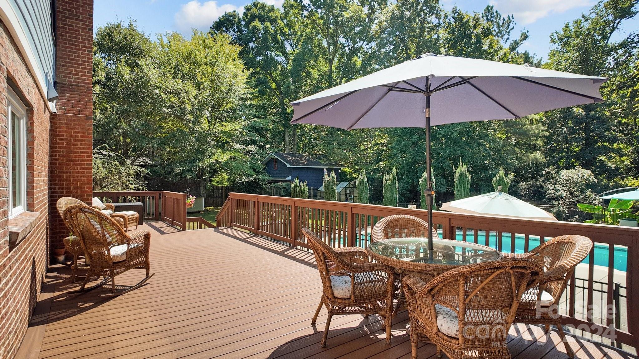 1060 Churchill Road Davidson, NC 28036 - Photo 6 of 41 a view of a patio with furniture and table