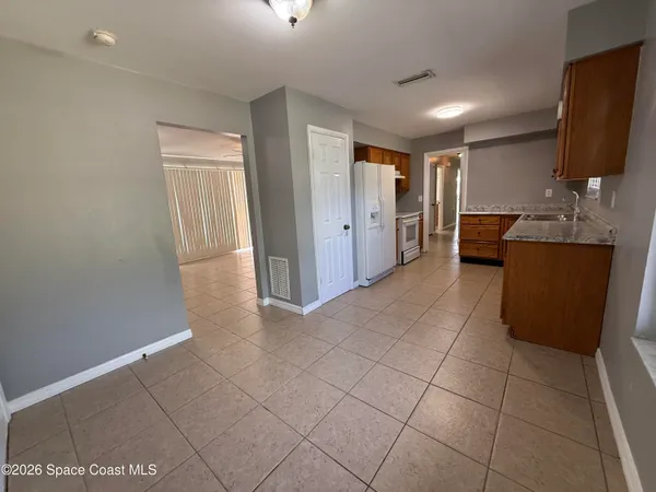 a view of livingroom with furniture and flat screen tv
