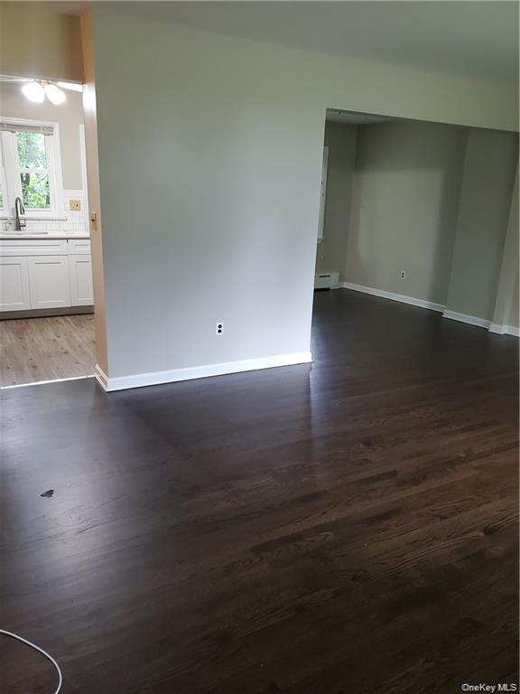 349 South Middletown Road Nanuet, NY 10954 - Photo 5 of 9 a view of room with window and wooden floor